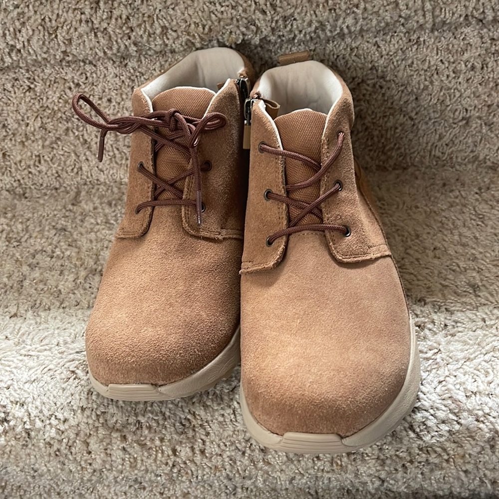 Almost new ugg ankle boots with side zipper. Size womens 6
